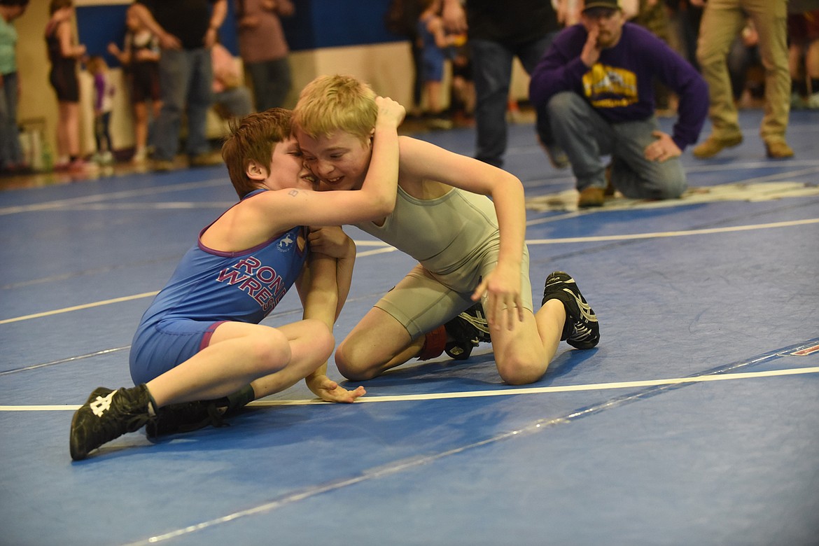 Mission&#146;s Braxton Wheeler wrestles Polson&#146;s Owen Shirtless at last Saturday&#146;s Little Guy Tournament in St. Ignatius. (Scott Shindledecker/Lake County Leader)