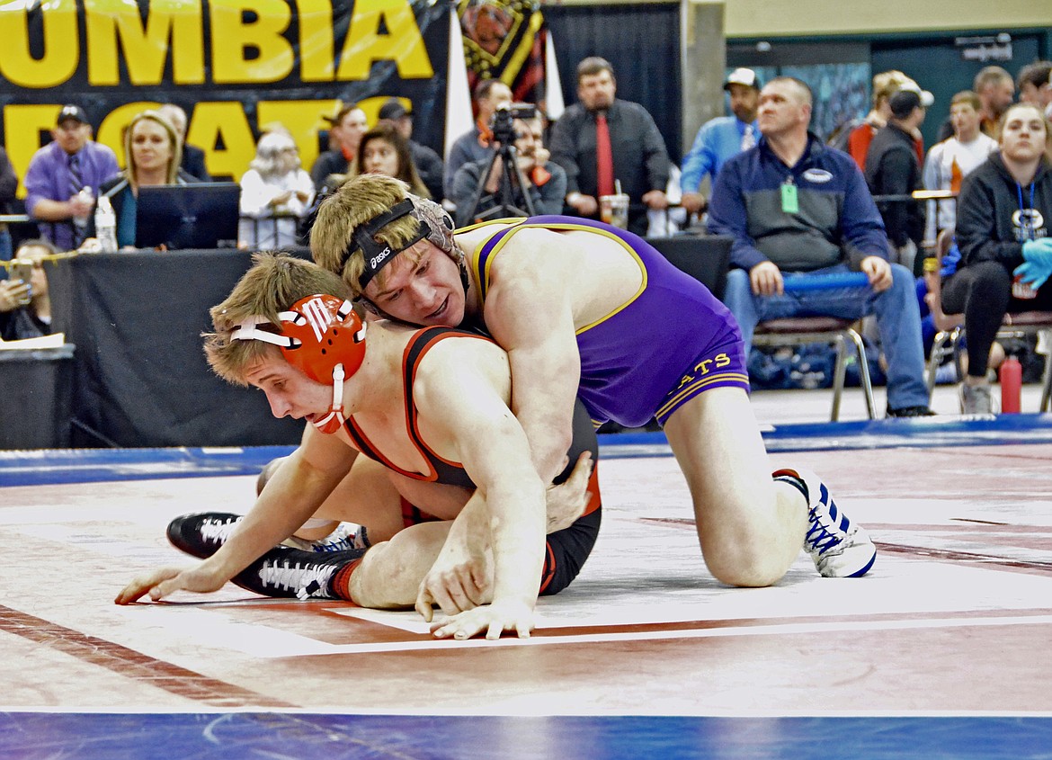 Photo by AMY MILLER
Judson Hall rides South Fremont&#146;s Beau Hackworth during the championship round of the State Wrestling Championships. Hall won the match 5-1.