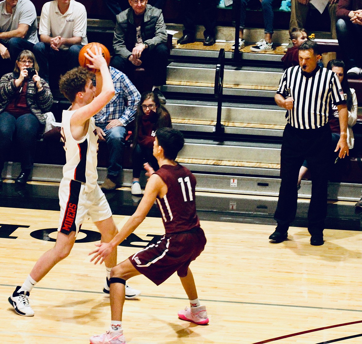 Photo by JOSH McDONALD
Wallace&#146;s Conner Denson (white jersey) keeps the ball away from a Kamiah defender during the Miners season-ending loss to the Kubs at North Idaho College.