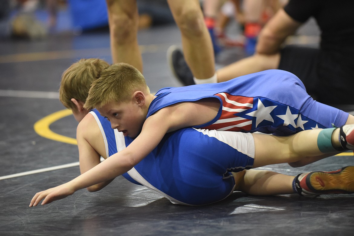 Superior’s Brody O’Neel battles Polson’s Korbyn Brumwell at the Mission Little Guy tournament last Saturday in St. Ignatius. (Scott Shindledecker/Mineral Independent)