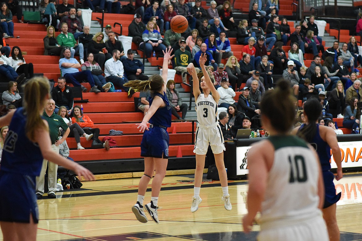 Taylor Means fires a three during Friday's loss to Corvallis at the Western A Divisional Tournament in Ronan. (Daniel McKay/Whitefish Pilot)