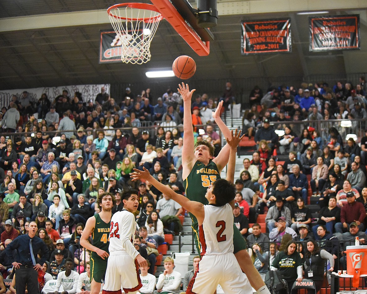 Talon Holmquist puts up a shot during Friday's loss to Browning at the Western A Divisional Tournament in Ronan. (Daniel McKay/Whitefish Pilot)