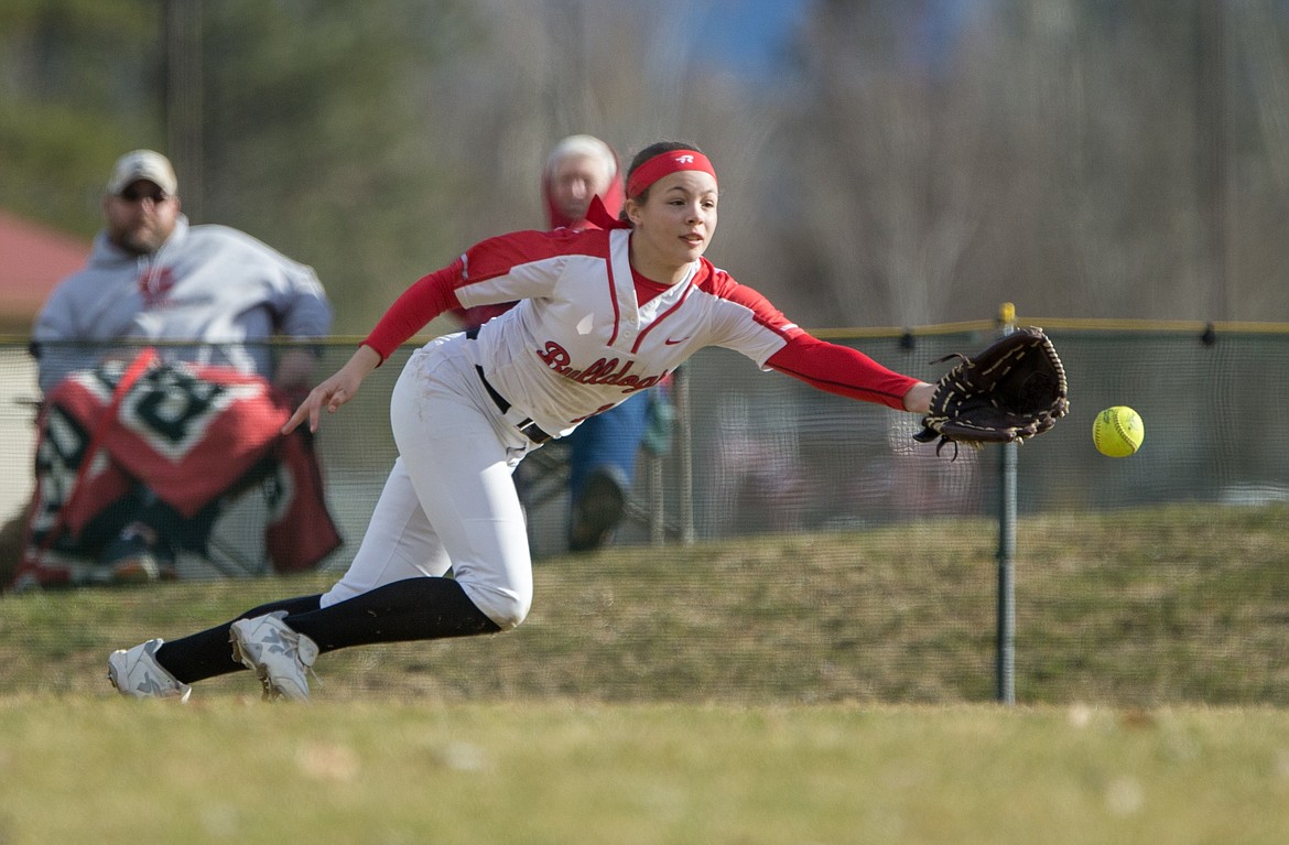 (Photo courtesy of JASON DUCHOW PHOTOGRAPHY) 
Sandpoint's Izzo Edwards lunges for a ground ball during a 2018 game.