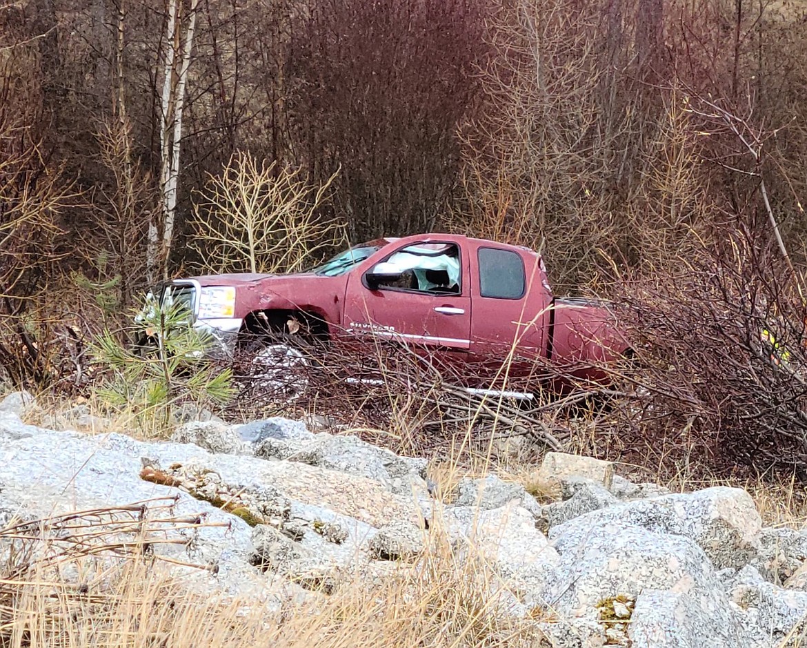 Photo by TONIA BROOKS 
A truck went about 200 feet off the road at the junction of HWY 1 and HWY 95 on Tuesday.