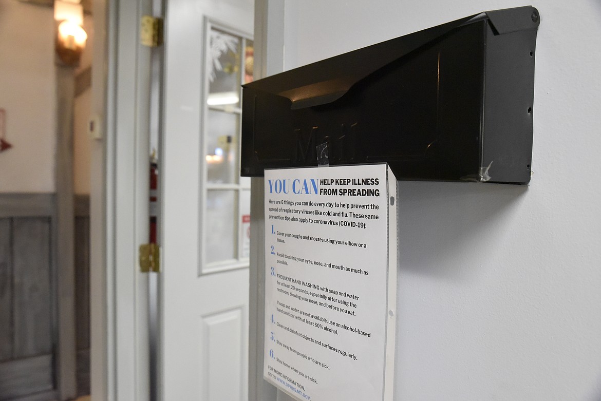 Signs with recommendations on how to avoid illnesses have gone up in and around area businesses in Lincoln County. (Derrick Perkins/The Western News)