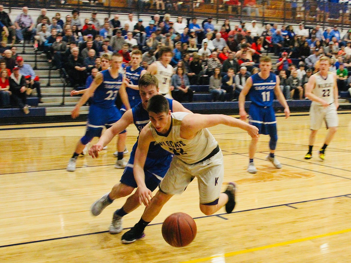 Photo by Josh McDonald/ Kellogg&#146;s Gavin Luna scrambles for a loose ball during the Wildcats&#146; game against Sugar Salem.