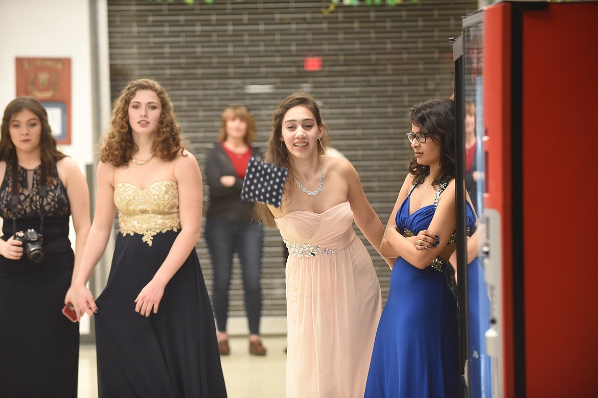 Thompson Falls junior Jasmin Pearson tries her hand at corn hole at the 2020 prom last Saturday. (Scott Shindledecker/Valley Press)