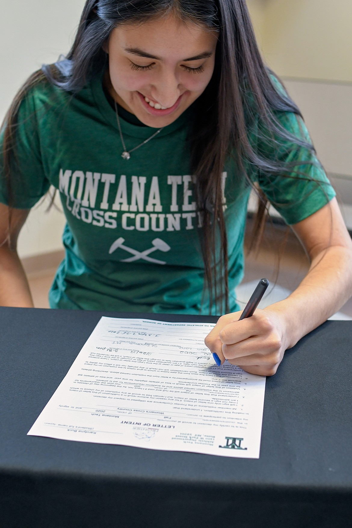 Mission senior Karolyna Buck signs a letter of intent to join Montana Tech&#146;s brand new cross-country program starting fall 2020. (Christa Umphrey photo)