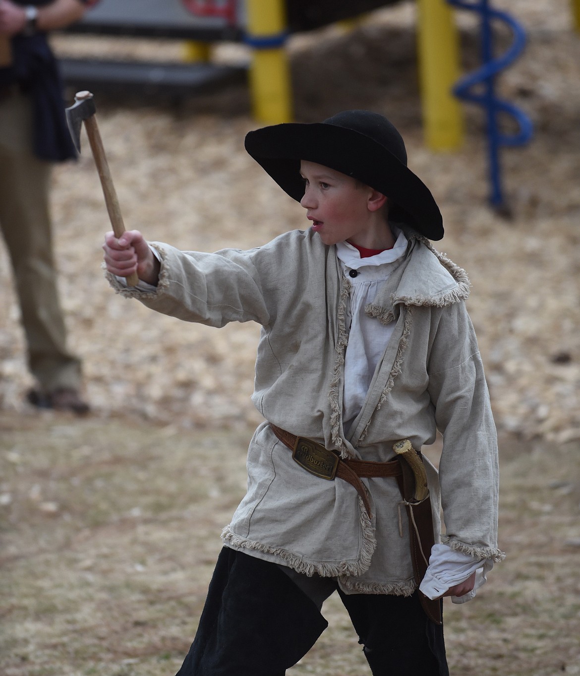 Andrew Wrobleski, 12, of Plains, throws the tomahawk during his presentation last Saturday at the Sanders County 4-H Communication Days event at Thompson Falls Elementary School. (Scott Shindledecker/Valley Press)