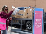Grocery stores encourage curbside pickup; Smith's limiting number of people in stores