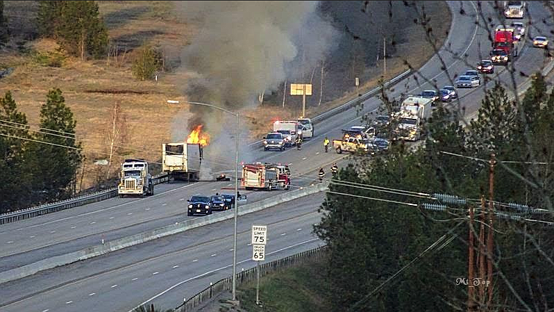 Photo by Mt_Top/
Traffic backs up on I-90 as emergency crews scramble to extinguish the burning semi-truck.