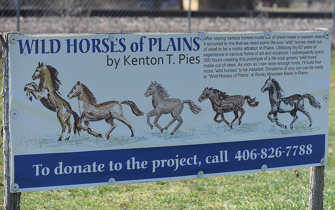 This sign explains the efforts of Plains artist Kenton Pies. Pies has built two metal horses which are displayed in downtown Plains and he is working on a third. (Scott Shindledecker/Valley Press)
