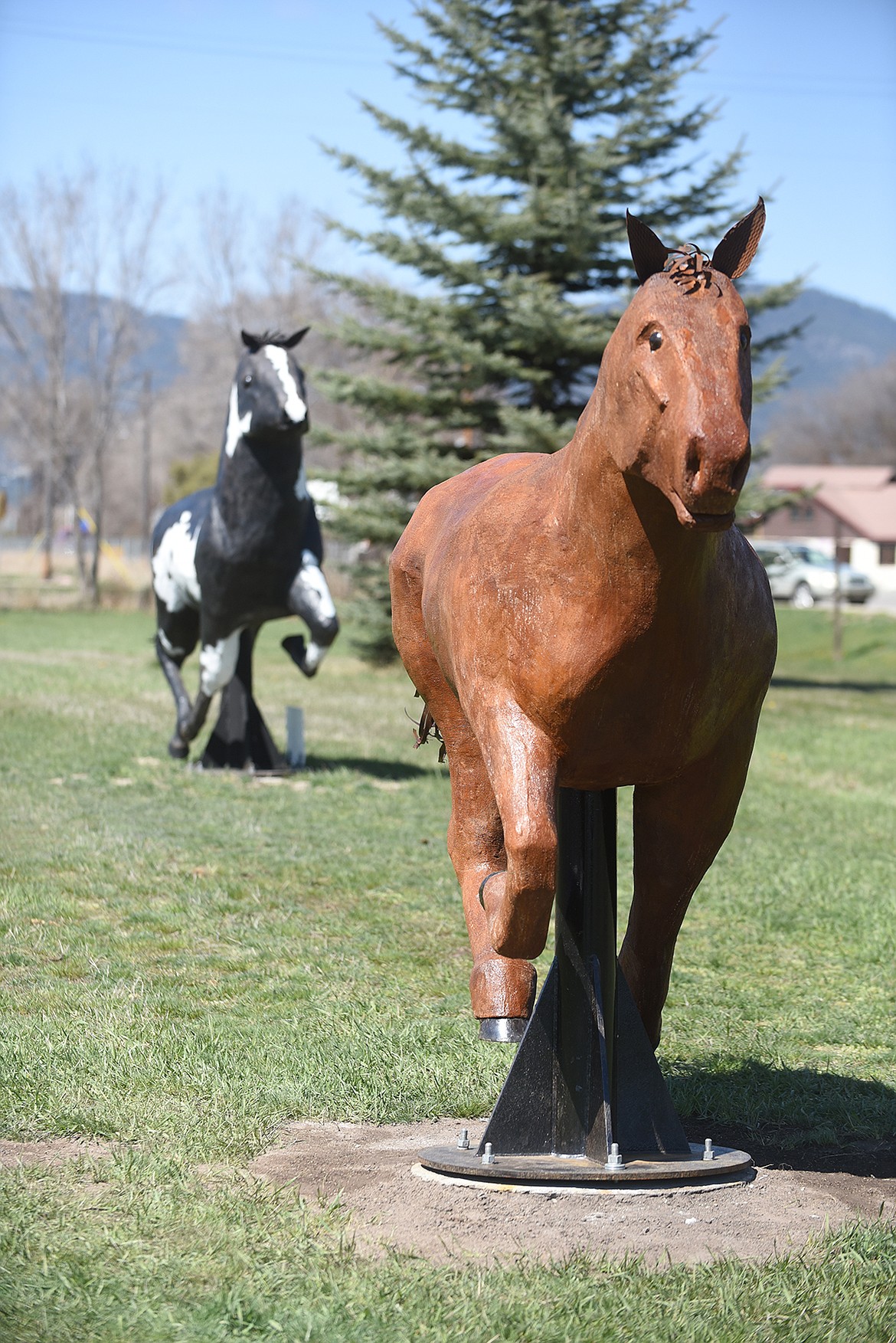 Plains artist Kenton Pies recently finished the second horse which is displayed in downtown Plains. He is currently working on a third. (Scott Shindledecker/Valley Press)