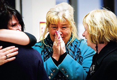 &lt;p&gt;Sherrie Johnson reacts outside a Kootenai County courthouse after learning that attempted murder and aggravated battery charges against her son, Adam M. Johnson, were dropped based on the findings of the grand jury.&lt;/p&gt;