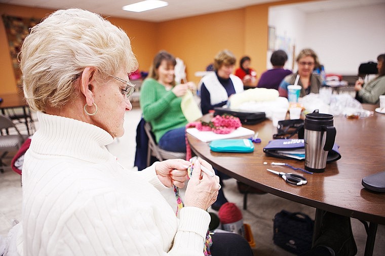 &lt;p&gt;Patrick Cote/Daily Inter Lake Syble Sanders, left, knits a scarf Friday afternoon during the &quot;Hugs For Hope Stitch Out&quot; at Bethany Lutheran Church in Bigfork. The Prayer Shawl Ministry group came together to make close to 50 scarves in the last week in tribute to the victims of Sandy Hook. The scarves with be distributed to The Samaritan House, Veterans Pantry and various other organizations throughout the Flathead community. Friday, Dec. 28, 2012 in Bigfork, Montana.&lt;/p&gt;