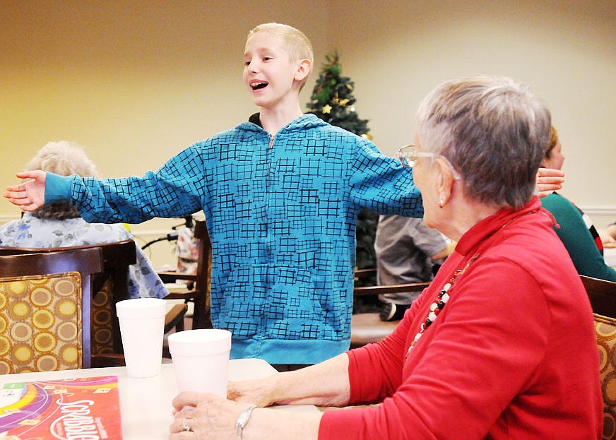 &lt;p class=&quot;p1&quot;&gt;&lt;strong&gt;Crossroads fifth-grade&lt;/strong&gt;r Quillan Stephens sings Christmas songs with Marlene Rutherford during a school visit to Buffalo Hill Terrace on Dec. 19, 2014. (Aaric Bryan/Daily Inter Lake)&lt;/p&gt;