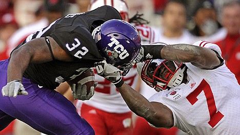 &lt;p&gt;Wisconsin's Aaron Henry, right, drags down TCU's Waymon James during the second half Saturday at Pasadena, Calif.&lt;/p&gt;