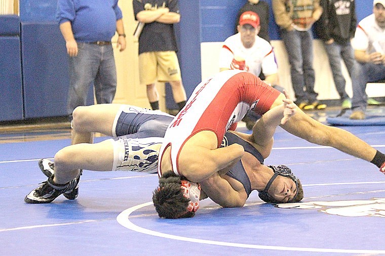 &lt;p&gt;A Bluehawk grappler looks to gain the advantage over a Warrior opponent during a match at the Mission Mountain Classic wrestling tournament on Dec. 22.&lt;/p&gt;