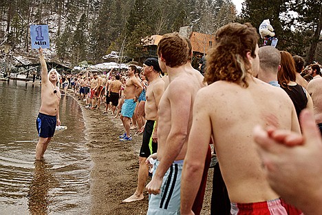 &lt;p&gt;Chad Bennett performs his duty for the 17th year in a row as the Polar Bear Plunge's official time keeper.&lt;/p&gt;