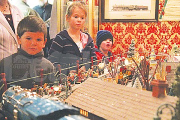 &lt;p&gt;Josiah Cappel watches as a model train comes barreling towards him, while Abigail Cappel (middle) and four-year-old Aiden Courville (back) have their eyes glued elsewhere.&lt;/p&gt;