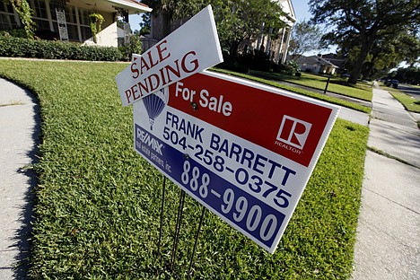 &lt;p&gt;In this Nov. 5, 2010 photo, a for sale sign with a &quot;sale pending&quot; sign attached is displayed at a home in New Orleans. The number of people who signed contracts to buy homes rose in November, the fourth increase since contract signings hit a low in June.&lt;/p&gt;