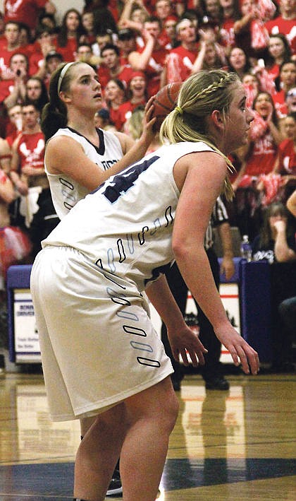 &lt;p&gt;Abby Davis gets ready to rebound as Kirsten Oxford shoots free throws in the Dec. 19 Moose Madness game. Oxford was the top scorer Monday in the West Valley Tournament opener against Colville.&lt;/p&gt;