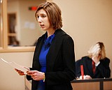 "Speech Mom" Ariel Ramstad of the Columbia Falls Speech and Debate team competes in the Kalispell Inivational on Friday, December 11, at Glacier High School.