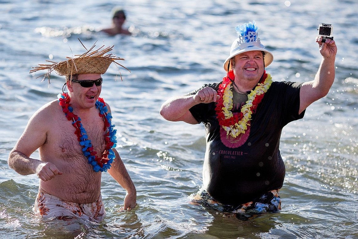 &lt;p&gt;Paul Michalowicz, left, and Ken Martin are decked out in tropical attire as they brave the chilly waters of Lake Coeur d'Alene on Friday during the annual Polar Bear Plunge at Sanders Beach in Coeur d'Alene. The two friends have done the plunge 22 years in a row together.&lt;/p&gt;