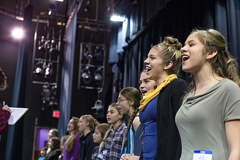 &lt;p&gt;Myra Gilge, 13, right, and Mari Gilge, 16, sing along to a pre-selected audition song for the fifth-annual Christian Youth Theater &#147;play in a day.&#148;&lt;/p&gt;