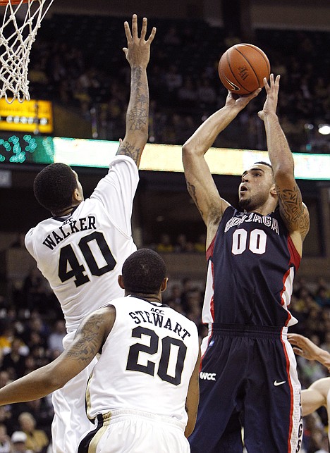 &lt;p&gt;Gonzaga's Robert Sacre shoots over Wake Forest's Ty Walker (40) and Ari Stewart (20) during the second half of Gonzaga's 73-63 win in Sunday in Winston-Salem, N.C.&lt;/p&gt;