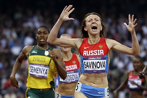 &lt;p&gt;Russia's Maria Savinova as she celebrates as she crosses the finish line ahead of South Africa's Caster Semenya to win the women's 800-meters final the athletics in the Olympic Stadium at the 2012 Summer Olympics, London, Aug. 11, 2012.&lt;/p&gt;