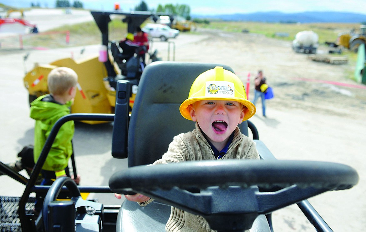 &lt;p class=&quot;p1&quot;&gt;&lt;strong&gt;Two-year-old&lt;/strong&gt; Maverick Bench grabs the steering wheel of a paver during the Community Action Partnership of Northwest Montana&#146;s Gravelpalooza at the LHC gravel pit near Kalispell. Children got to help drive about 20 pieces of heavy equipment. &#147;There are a lot of excited kids,&#148; LHC owner Jeff Claridge said. &#147;They love it. They just love it. And the adults love it too.&#148; (Aaric Bryan/Daily Inter Lake)&lt;/p&gt;