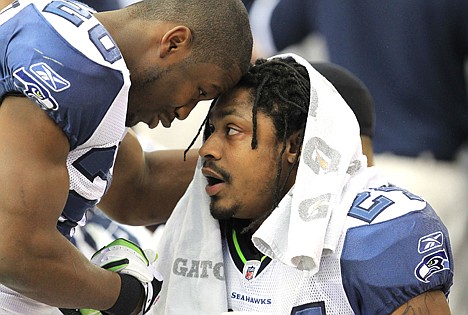 &lt;p&gt;Seattle's Marshawn Lynch, right, talks with Justin Forsett (20) during Sunday's game against Arizona in Glendale, Ariz. Lynch finished the season with a career-best 1,204 yards and 12 touchdowns.&lt;/p&gt;