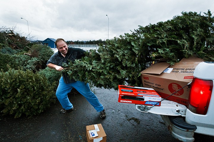 &lt;p&gt;SHAWN GUST/Press Jake Isaksen, of Hayden, drops off his Christmas tree Monday at the Kootenai County Solid Waste Department's Ramsey Road transfer station in Coeur d'Alene. The transfer station expects to see large amounts of trees and other holiday waste throughout the next week.&lt;/p&gt;