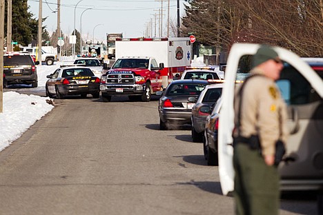 &lt;p&gt;A Northern Lakes Fire District ambulance weaves around Kootenai County Sheriff's Department vehicles while leaving the scene of the shooting.&lt;/p&gt;