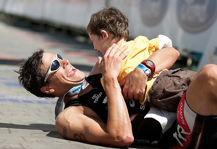 &lt;p&gt;SHAWN GUST/Press Andy Potts, of Colorado Springs, rolls on the ground with his two-year-old son, Boston, after winning the 2010 Ford Ironman Coeur d'Alene Sunday, June 27 with a time of 08:24:14.&lt;/p&gt;