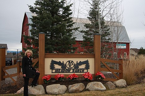 &lt;p&gt;Sharon Cunningham of ActiveWest Builders stands next to the sign for Meadow Ranch, a rural oasis ideally located close to a wide variety of amenities.&lt;/p&gt;