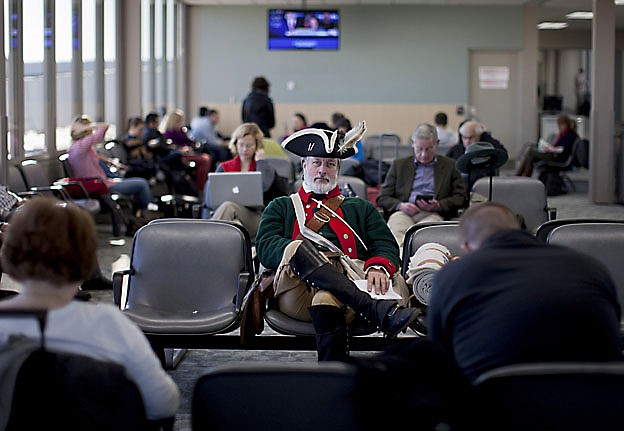 &lt;p&gt;Tea party supporter William Temple, of Brunswick, Ga., sits in the Des Moines Airport heading to go home after the Iowa caucus, Wednesday, Jan. 4, 2012, in Des Moines, Iowa. (AP Photo/Evan Vucci)&lt;/p&gt;