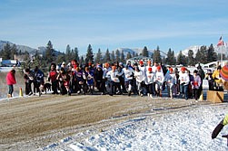 Runner break from the starting line during last Saturday's New Years Fun Run in Thompson Falls.