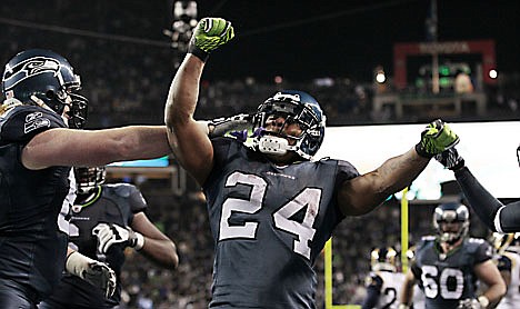 &lt;p&gt;Seattle Seahawks' Marshawn Lynch celebrates his 16-yard touchdown run against the St. Louis Rams in the second half of an NFL football game, Monday, Dec. 12, 2011, in Seattle. The Seahawks won 30-13. (AP Photo/Elaine Thompson)&lt;/p&gt;