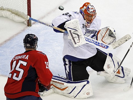 &lt;p&gt;Washington's Jason Chimera (25) looks for a rebound after Tampa Bay lightning goalie Dwayne Roloson deflects a shot during the third period Tuesday at Washington. The Lightning defeated the Capitals 1-0 in overtime.&lt;/p&gt;