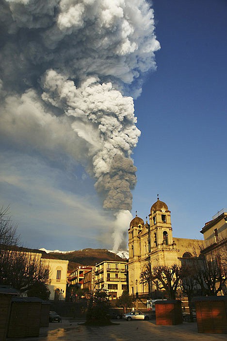 &lt;p&gt;Smoke and ash billows from Mount Etna framed by the Sicilian town of Zafferana, near Catania, southern Italy, Thursday. The eruption of the Mount Etna volcano lasted a few hours and was the first in 2012.&lt;/p&gt;