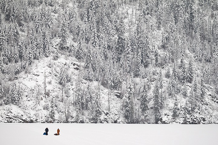 &lt;p&gt;Jim Headley, left, and Roger Brockhoff walk across Fernan Lake after spending a few hours ice fishing.&lt;/p&gt;
