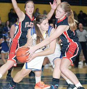 &lt;p&gt;Devon Gallagher, center, looks to pass iin 2nd quarter with Flathead's Mary Heaton, left and Sophie Asa right. Fouled by Heaton and 0 for 1 from the charity stripe.&lt;/p&gt;