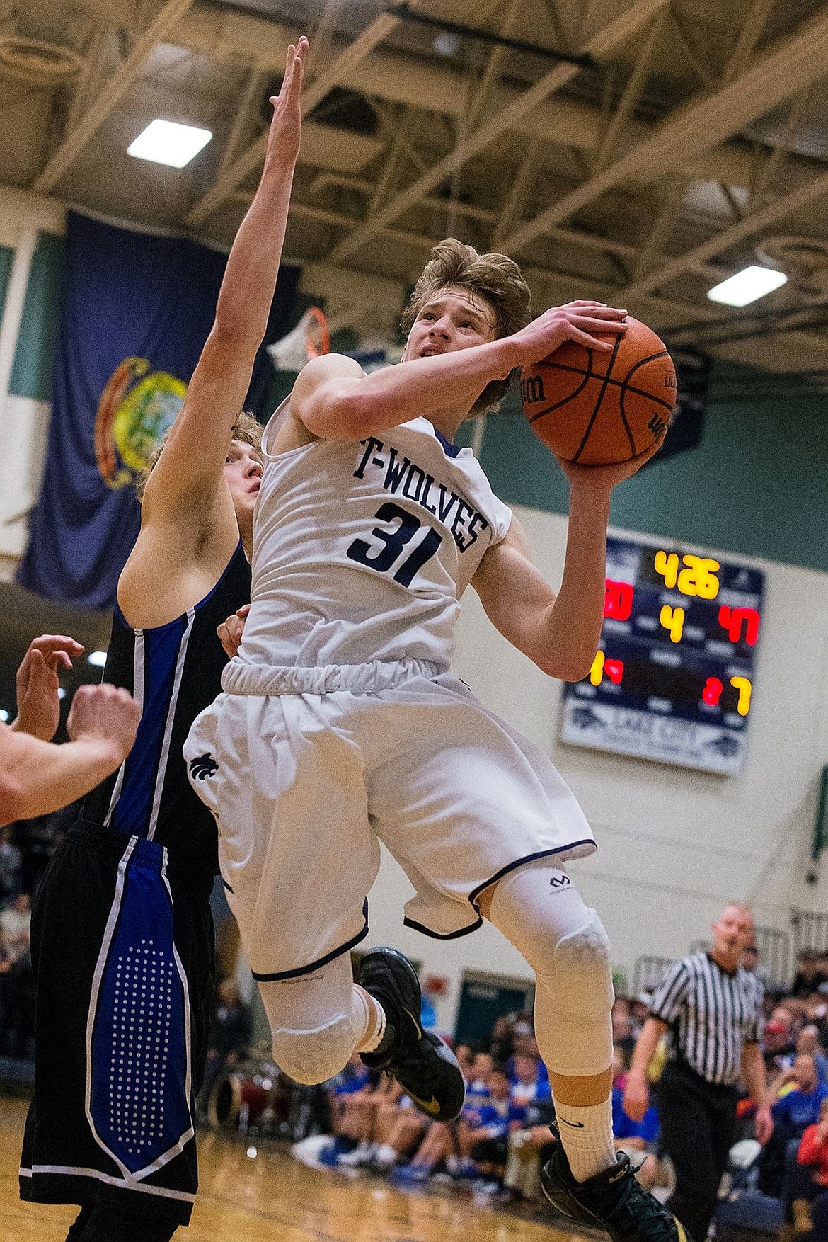 &lt;p&gt;SHAWN GUST/Press Lake City High&#146;s Kyle Manzardo drives past Coeur d&#146;Alene&#146;s Joey Naccarato during the fourth quarter.&lt;/p&gt;