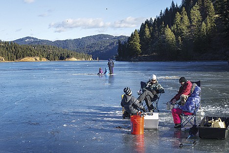 &lt;p&gt;The Nichols family waits on the ice of Fernan Lake for fish to bite on Saturday.&lt;/p&gt;