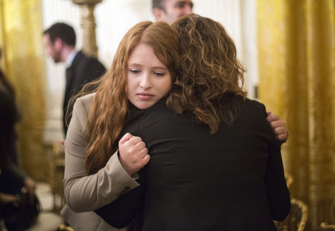 &lt;p&gt;White House guests and victims of gun violence console one another after listening to President Barack Obama spoke in the East Room of the White House in Washington, Tuesday, Jan. 5, 2016, about steps his administration is taking to reduce gun violence. (AP Photo/Pablo Martinez Monsivais)&lt;/p&gt;