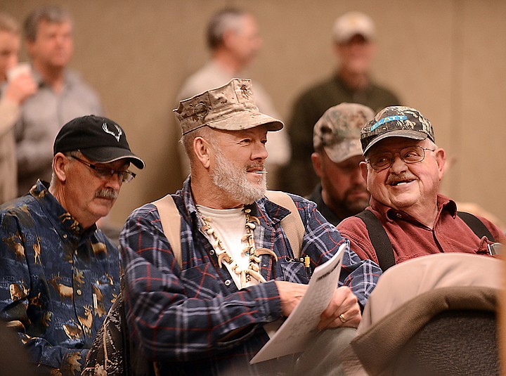 &lt;p&gt;From left, John Van Dort and Marv Bert, both of Kalispell, share a smile before the start of the Montana Fish, Wildlife and Parks meeting to address the 2014-2015 hunting regulation proposals on Saturday, January 4, in Kalispell.&lt;/p&gt;