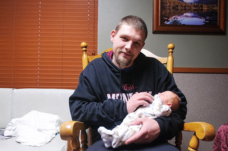 &lt;p&gt;Travyn Eric Lee Thornton was born six pounds, 12 ounces and 19 inches long at 5:22 a.m. on January 1st to parents Eric Thornton and Jessica Skokan. Jan. 2, 2014 in Kalispell, Montana. (Patrick Cote/Daily Inter Lake)&lt;/p&gt;