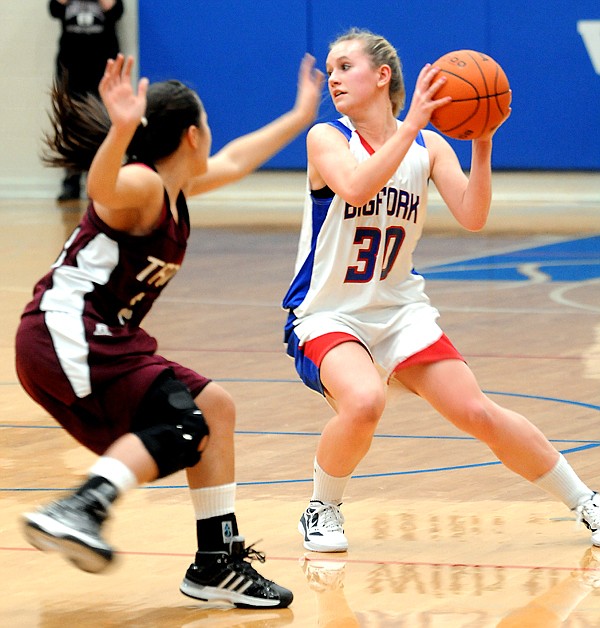 <p>Bigfork senior Taylor Peck (30) looks to pass while pressured by
Troy junior Alanah True-Silva, during Fridays District 7B game in
Bigfork.</p>
<p> </p>